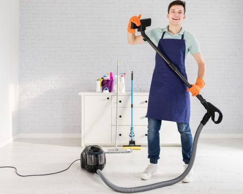 portrait-man-cleaning-his-house